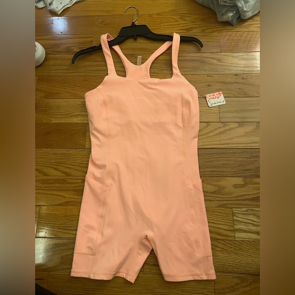 Free people movement light orange workout one piece